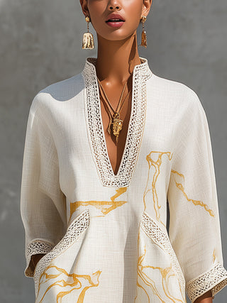 Aliénor Gold Motif Mini Dress