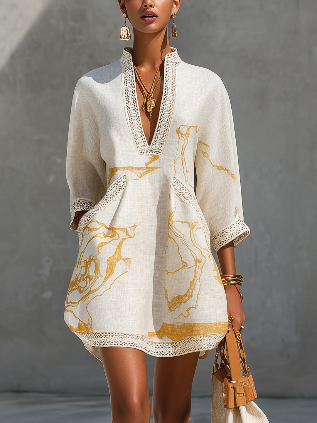 Aliénor Gold Motif Mini Dress