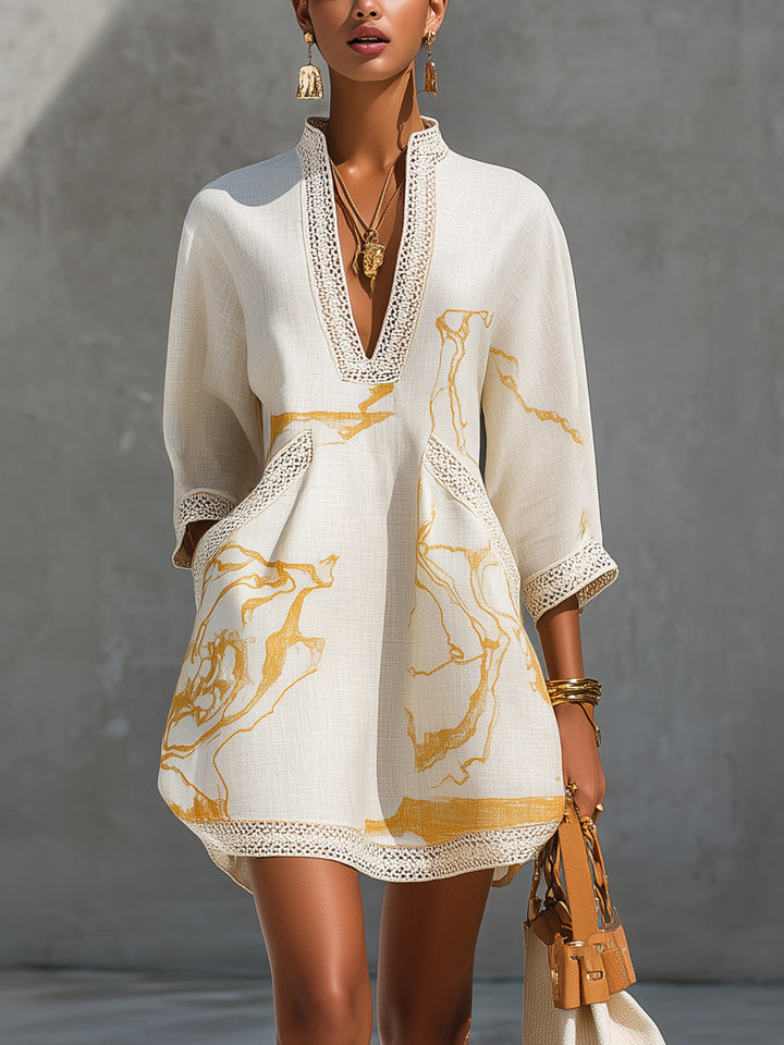 Aliénor Gold Motif Mini Dress