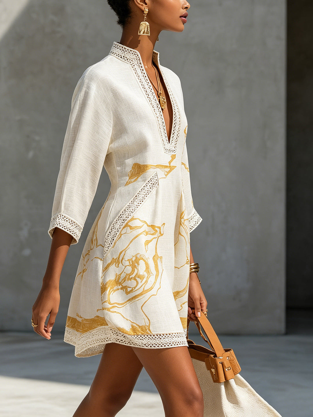 Aliénor Gold Motif Mini Dress