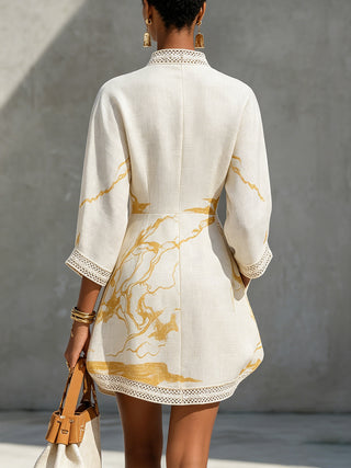 Aliénor Gold Motif Mini Dress